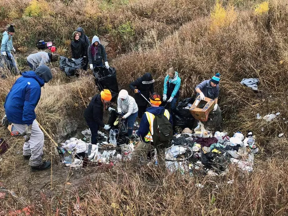 Volunteers clean Reserve Street homeless camp; residents allowed to keep shelters