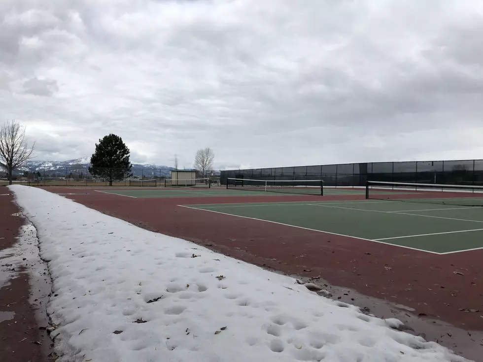 Mother Nature clears city tennis courts of snow for high school teams