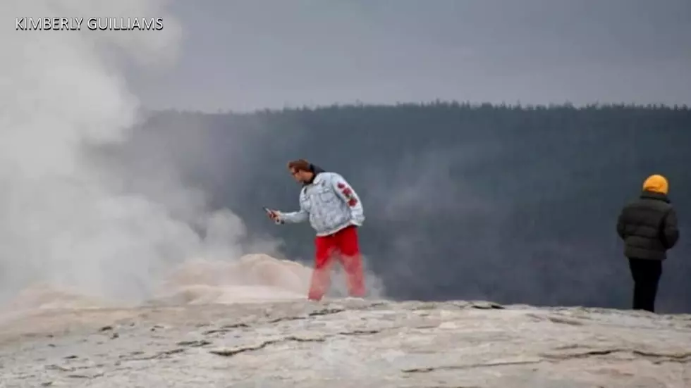 Yellowstone National Park: Men cited for walking perilously close to Old Faithful
