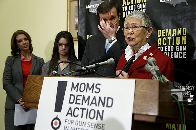 Then-U.S. Representative Carolyn McCarthy (D-NY) (R) speaks at a news conference held by the groups Mayors Against Illegal Guns and Moms Demand Action for Gun Sense in America, on Capitol Hill in Washington, in this February 12, 2014 file photo.   REUTERS/Jonathan Ernst/Files