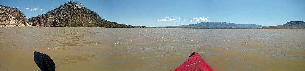 Paddling the muddy waters of Buffalo Bill Reservoir west of Cody, Wyoming. (Photo by Martin Kidston)
