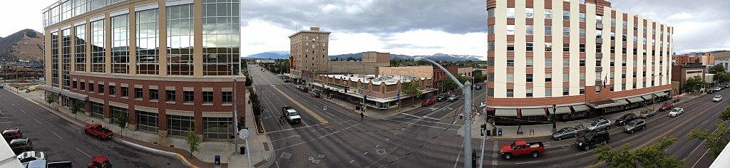Traffic picks up on the corner of Front Street and Higgins Avenue in downtown Missoula, as seen from the roof of the Missoula Mercantile. (Photo by Martin Kidston)