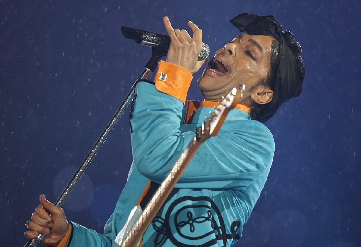 Prince performs during the halftime show of the NFL's Super Bowl XLI football game between the Chicago Bears and the Indianapolis Colts in Miami, Florida, February 4, 2007. REUTERS/Mike Blake/Files