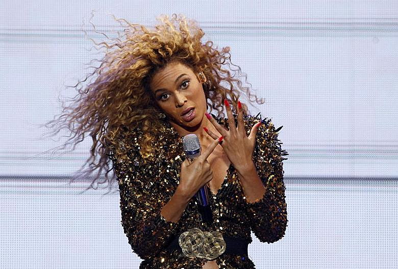 Beyonce performs on the Pyramid stage at the Glastonbury Festival in Somerset, in this file photo taken June 26, 2011. REUTERS/Cathal McNaughton