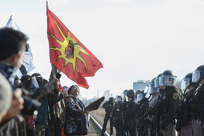 Protesters have a stand off with police during a demonstration against the Dakota Access pipeline near the Standing Rock Indian Reservation in Mandan, North Dakota, November 15, 2016. REUTERS/Stephanie Keith