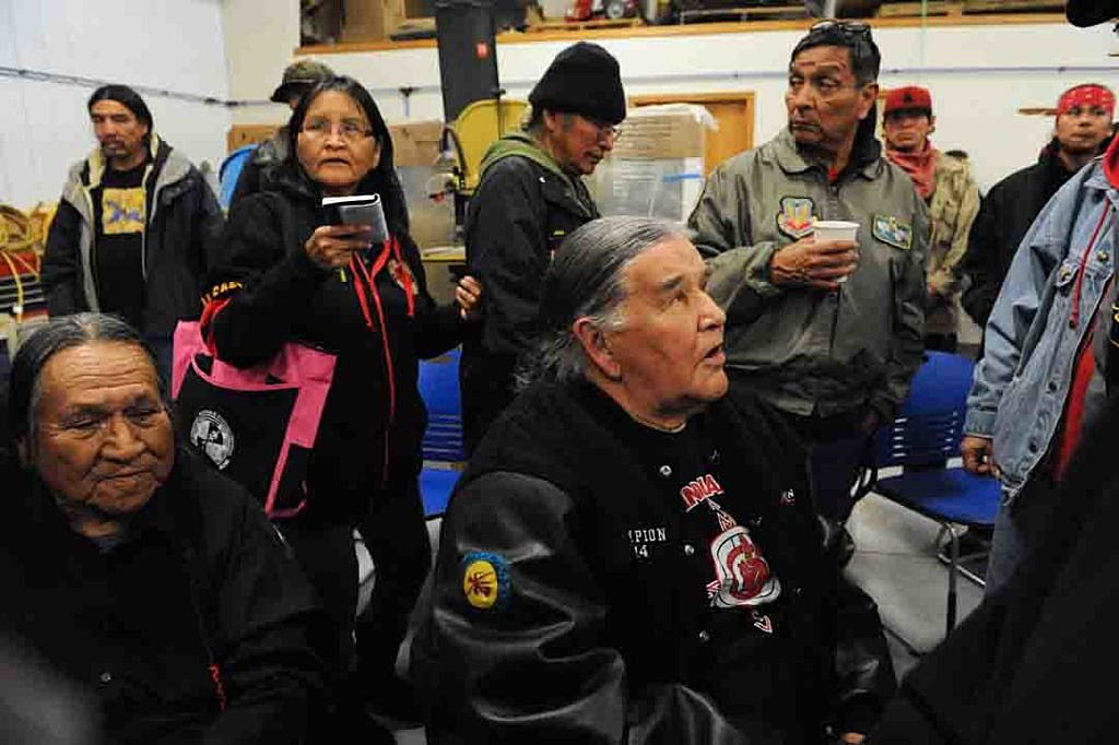 Veterans attend a Sioux tribal welcome meeting at Sitting Bull College as &quot;water protectors&quot; continue to demonstrate against plans to pass the Dakota Access pipeline near the Standing Rock Indian Reservation, in Fort Yates, North Dakota, U.S. December 3, 2016. REUTERS/Stephanie Keith