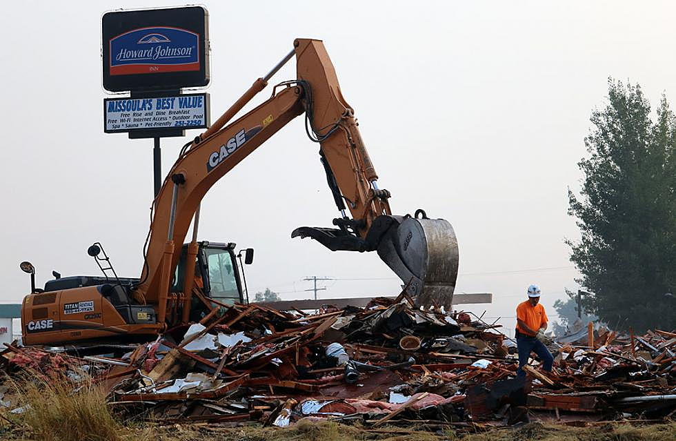 Demolition of old hotel begins to make room for supersized car wash